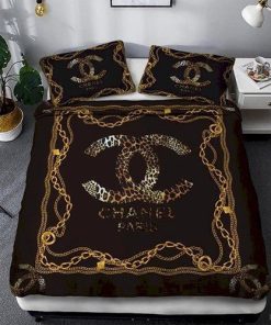 Chanel Logo Golden in Black Background Bedding Set